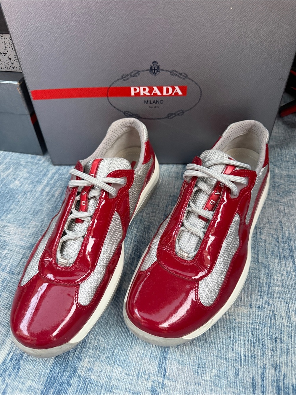Prada women’s  Red and Gray Patent Leather Low-Top Sneakers